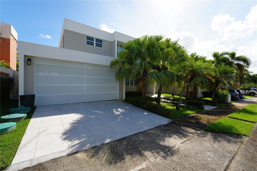 Two-story single family residence remodeled in 2015, located within the Paseo Las Olas complex inside the Los Paseos development in Dorado. The home offers 4 bedrooms and 2.5 bathrooms across approximately 2,250 square feet of construction on a 504 square meter lot. All bedrooms are situated on the second level. 

The first level features the living room, dining area, remodeled kitchen, family room or home office, half bath, and interior laundry near the carport access. The updated kitchen includes matte-finish cabinetry, quartz countertops, waterfall-style center island, porcelain backsplash, gas range, and stainless steel appliances. Bathrooms were remodeled with wood-look tile finishes, and glass-enclosed showers. The primary bathroom features a double vanity and shower panel. 

The home includes 6 inverter mini-split AC units, diesel power generator, electric water heater, covered 2-car carport, and EV charging connection. All appliances included with the sale. 

Paseo Las Olas community amenities include a swimming pool and tennis court, with double controlled access through the Los Paseos main guardhouse and the Paseo Las Olas gated entry. 

Conveniently located near restaurants, hospitals, and schools. HOA approximately $2,200 annually.