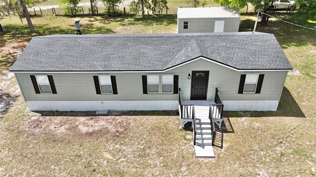 Photo of 15840 SW 100th Avenue, Dunnellon, FL 34432 (MLS # S5147188)