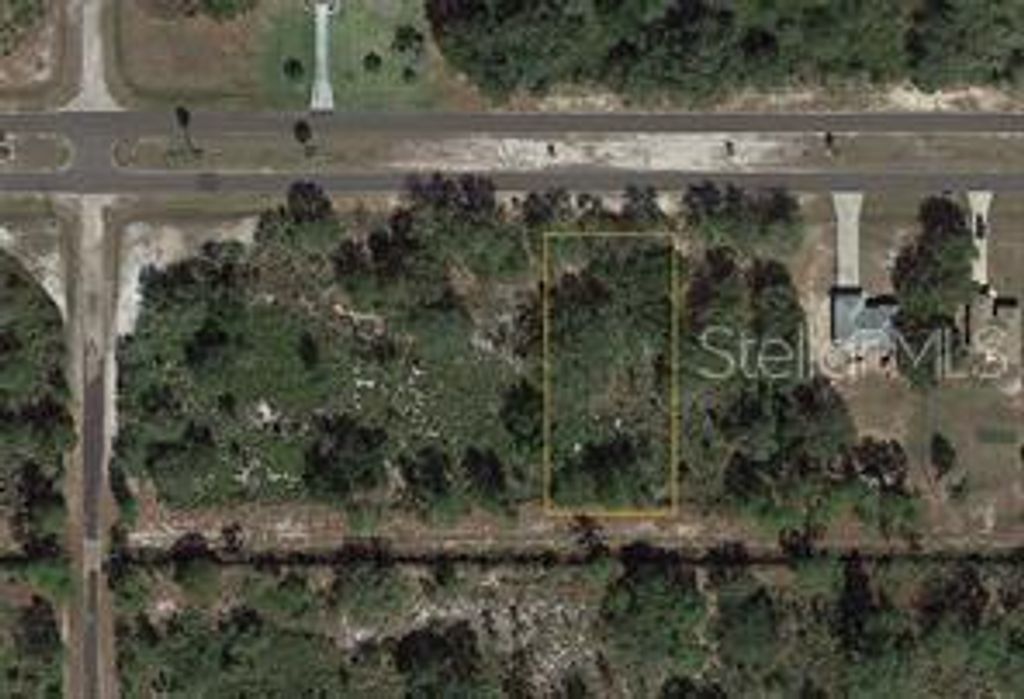 Photo of 617 Park Avenue, Indian Lake Estates, FL 33855 (MLS # O6292293)