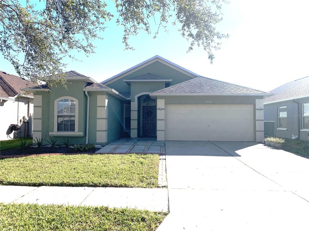 Photo of 8408 Canterbury Lake Boulevard, Tampa, FL 33619 (MLS # TB8454025)