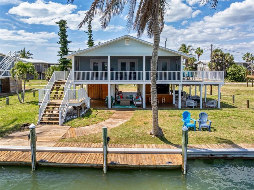 Welcome to Waters Edge, a true hidden gem on Little Gasparilla Island-where turquoise water, gentle breezes, and total relaxation replace traffic, noise, and stress. Accessible only by boat or ferry, this canal-front island retreat offers the rare combination of private dockage, bay views, and walkable Gulf beaches-all in one unforgettable setting.

This beautifully designed home makes  it the perfect place to unplug and embrace island life. With 60 feet of private dock space, boaters, anglers, and water lovers will feel right at home. Bring your boat, paddleboards, or kayaks and explore the surrounding waters at your own pace.

Inside, the open-concept living space is filled with natural light and water views from the kitchen, dining, and living areas. Three French doors open to the screened upper deck, creating seamless indoor-outdoor living-perfect for morning coffee, evening cocktails, and entertaining with friends.

Step outside and discover multiple outdoor spaces designed for relaxation and fun. The bayfront porch offers breathtaking sunrise views, while the lower-level deck is ideal for fishing, cleaning your catch, or simply unwinding by the water. After a beach day, rinse off in the large outdoor shower before settling in for a peaceful island evening.

Just a short walk from the home, you'll find some of the most spectacular sunsets on the Gulf Coast-a nightly show that never gets old.


Details: All rates subject to 12% Florida Lodging Tax, cleaning fee, and reservation fee. Three percent credit card processing fee applies, avoid by paying via check. No smoking permitted