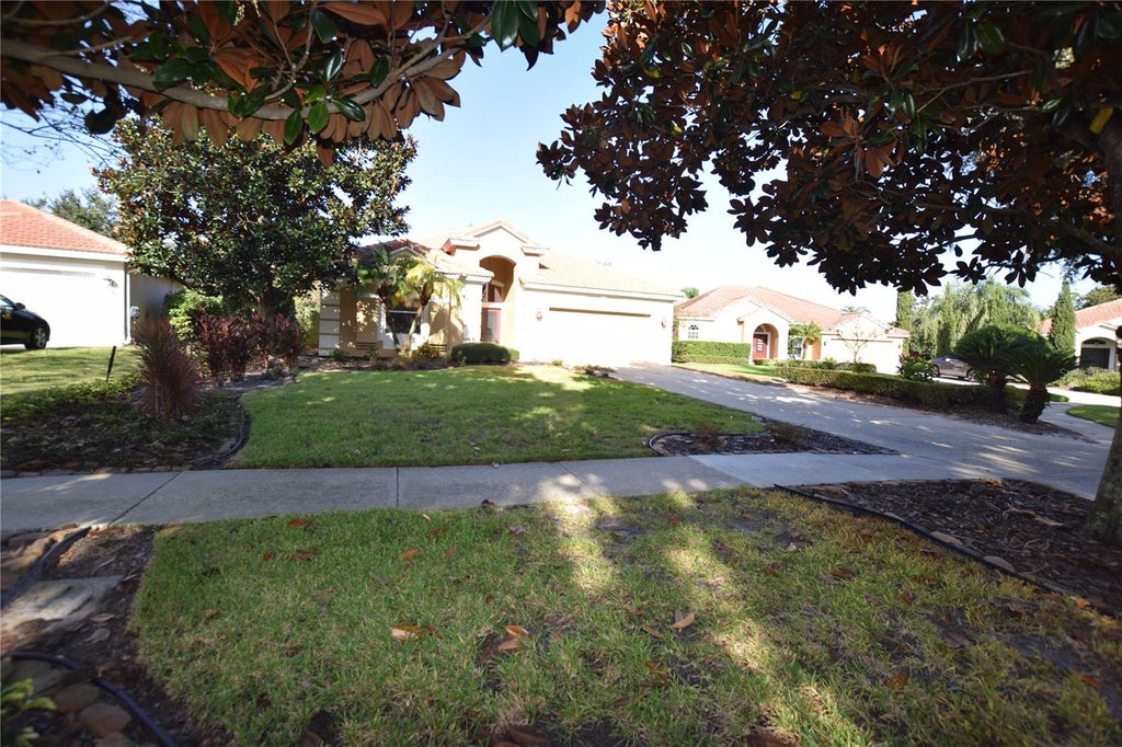 Photo of 6342 Crestmont Glen Lane, Windermere, FL 34786 (MLS # O6453133)