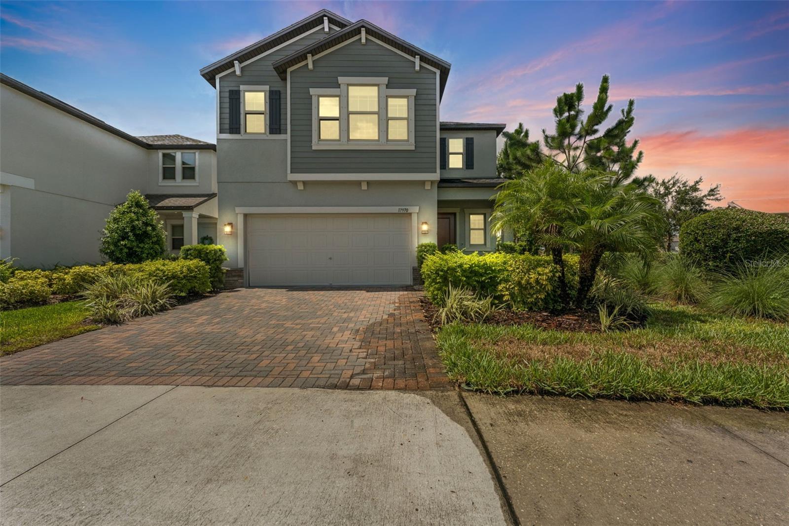 Welcome to your dream home in the highly sought-after Bexley community of Land O’ Lakes! This beautifully designed 4-bedroom home with a spacious loft, 2.5 bathrooms, and a 2-car garage offers modern living with upscale finishes throughout. Step inside to find a bright, open floor plan filled with natural light, highlighted by designer ceramic tile floors that span the entire downstairs. The gourmet kitchen is the heart of the home, featuring solid white cabinetry, gleaming white quartz countertops, a large kitchen island, stainless steel appliances with a gas stove, recessed lighting, and a generous walk-in pantry—perfect for both everyday living and entertaining. Upstairs, brand-new carpeting adds comfort to the bedrooms and loft area, while ceiling fans throughout the home ensure year-round comfort. The expansive master suite includes an oversized walk-in closet and a luxurious ensuite bathroom with a soaking tub, walk-in shower, and dual vanities. Enjoy the curb appeal of a brick paver driveway and walkway, along with access to all the top-tier amenities that Bexley has to offer—including two resort-style pools, a state-of-the-art fitness center, open-air game room, multiple playgrounds and parks, soccer fields, splash zone, dog park, and miles of scenic trails with fitness stations. Conveniently located near top-rated schools, medical facilities, premier shopping and dining, and with easy access to the Suncoast Parkway for a quick commute to Tampa, this home truly has it all. Don’t miss your opportunity to live in one of Land O’ Lakes’ most vibrant and amenity-rich communities! Our application process is quick and easy, apply today!