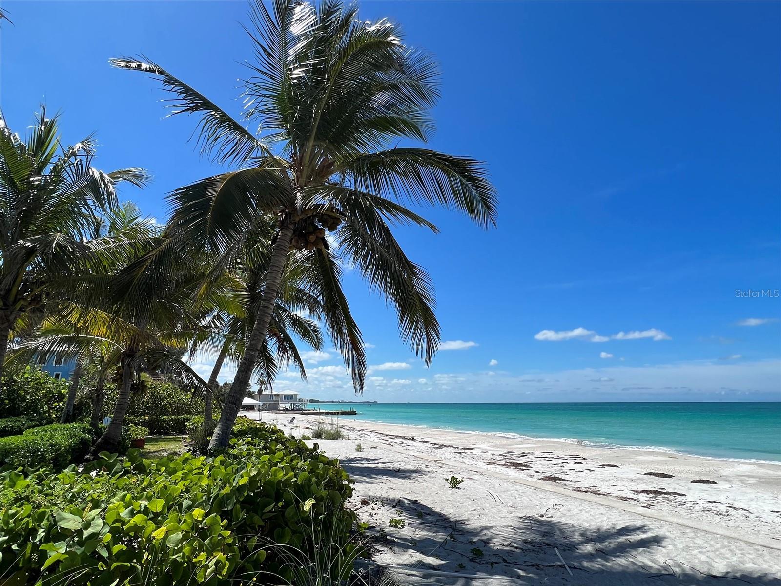 Discover a truly rare opportunity to own two parcels in a new, beachfront enclave being developed with private entry gates directly on the pristine sugar sand and turquoise waters of the Gulf of Mexico. The offering includes: Parcel One - Property ID: 7847710154 - 72,000 sq. ft. homesite with 100 ft. of direct Gulf frontage. Parcel Two - Property ID: 7847700007 - A 9,757 sq. ft. privately owned, secluded cul-de-sac providing private access for just two Gulf-front estates, ensuring unmatched exclusivity. Nestled at the end of North Gulfside Road. This serene setting offers endless views, peaceful surroundings, and an unparalleled level of privacy. The existing residence sustained significant damage during hurricane Helene and can be transformed into a modern coastal retreat or removed to create a brand-new luxury tropical estate. Enjoy the very best of Gulf-front living—quiet, private, and breathtakingly beautiful. This is an active construction site with restricted access. Contact the listing Realtor for access.