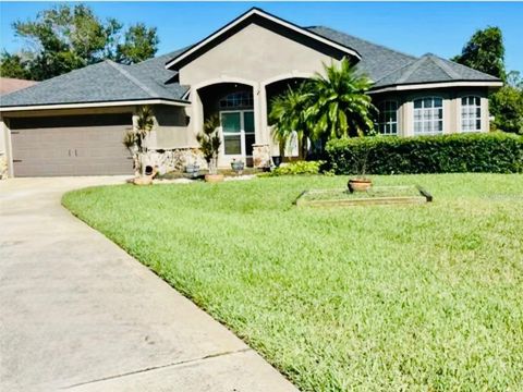 Photo of 1302 Pine Song Drive, Deltona, FL 32725 (MLS # O6357069)