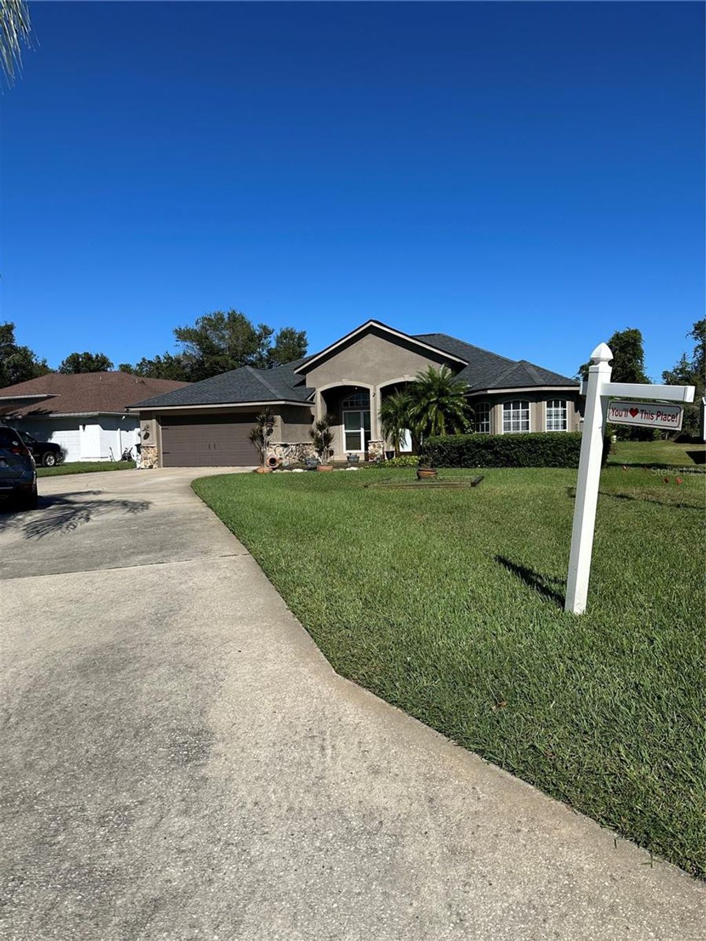Photo of 1302 Pine Song Drive, Deltona, FL 32725 (MLS # O6357069)