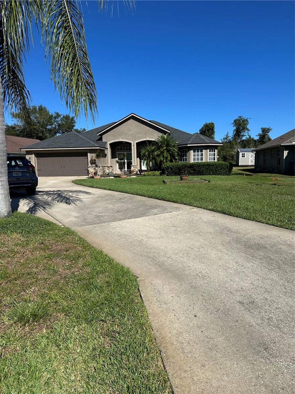 Photo of 1302 Pine Song Drive, Deltona, FL 32725 (MLS # O6357069)
