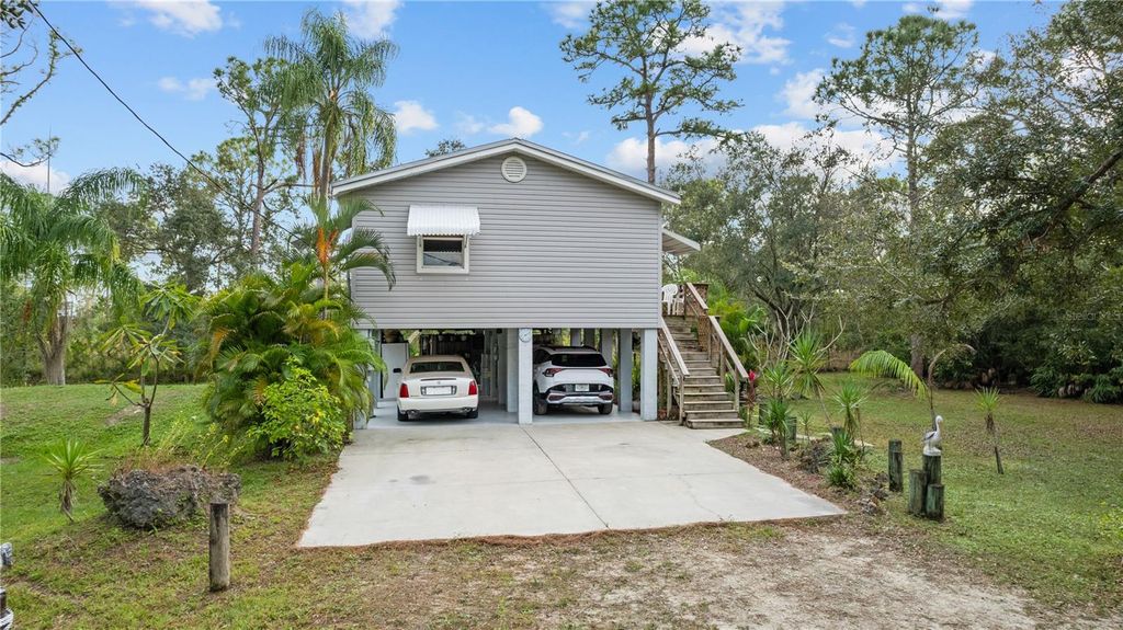 Photo of 39200 Cook Brown Road, Punta Gorda, FL 33982 (MLS # A4634802)