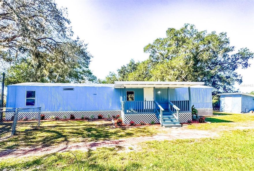 Welcome home to this newly updated 3-bedroom, 2-bath manufactured home offering comfortable living and modern touches throughout. Inside, you’ll find new luxury vinyl flooring, freshly painted interiors, and indoor laundry conveniently located off the primary bedroom. Both bathrooms have been nicely updated. Newly upgraded kitchen featuring new cabinets and a sink and new light fixtures, this home is move-in ready. The bright, open-concept living area is perfect for everyday living, and the desirable split floor plan provides privacy and space for the whole family. Step outside and enjoy a covered front porch that’s perfect for morning coffee or evening relaxation. The home sits on an easy-to-maintain lot with a shed for your storage needs. Located in Polk City, you’ll enjoy the charm of small-town Florida living while being conveniently close to all the city amenities you could ever need. Just off I-4, you’ll have effortless access to the vibrant cities of Tampa and Orlando, along with iconic destinations like Disney and Busch Gardens! Ideal for a first-time homeowner or retiree looking for an affordable, charming, move-in-ready home. Best of all no HOA to limit your freedom!