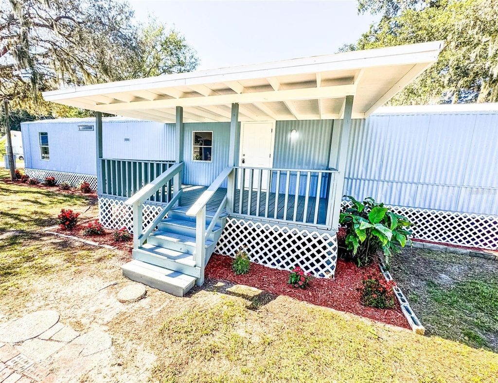 Photo of 688 4th Street, Polk City, FL 33868 (MLS # B4902090)