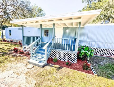 Photo of 688 4th Street, Polk City, FL 33868 (MLS # B4902090)