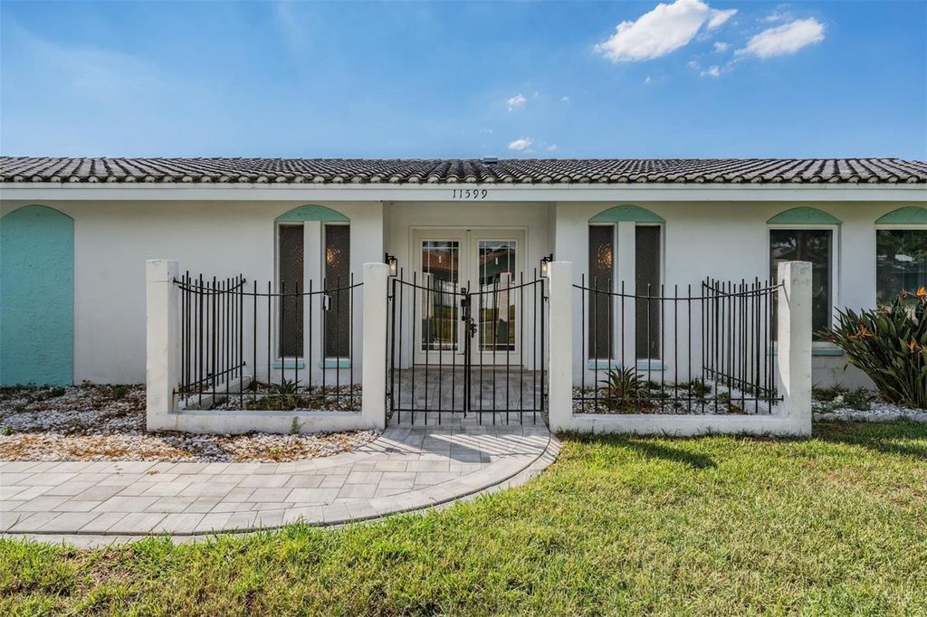 Photo of 11599 Grove Street, Seminole, FL 33772 (MLS # TB8506593)