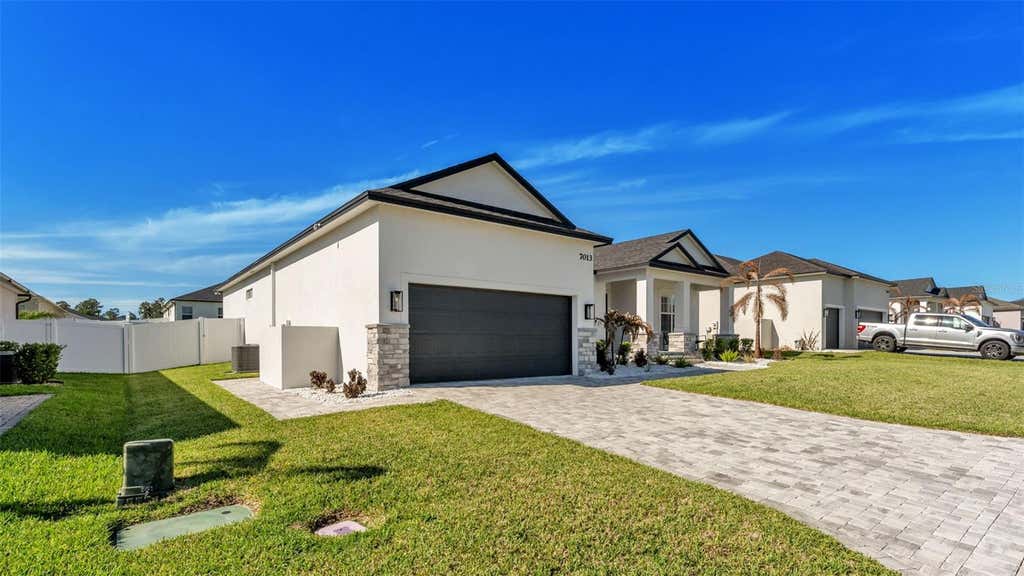 Photo of 7013 Bentridge Drive, Lakeland, FL 33813 (MLS # R4911775)