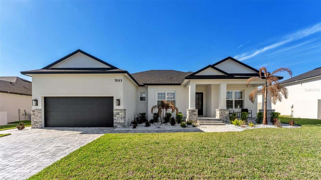 Photo of 7013 Bentridge Drive, Lakeland, FL 33813 (MLS # R4911775)