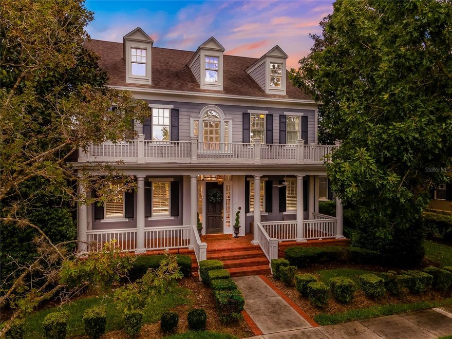 Experience the quintessential lifestyle of Celebration, FL, where luxury meets small-town charm. This home is a rare find, offering unmatched elegance and convenience and located in the coveted Main Village of Celebration! This beautifully renovated residence offers a perfect blend of luxury, comfort, and convenience, just a short walk from downtown shops and restaurants. This home features 7 bedrooms, with 3 conveniently located on the first floor, and 5 fully renovated bathrooms. Recent upgrades include a new downstairs AC compressor in 2024, a new roof in 2017, and newer windows. The owner's retreat, located on the first floor, boasts newer wood floors, dual sinks, a jetted tub, and an XL shower. The Brazilian plank cherry hardwood floors extend throughout the first and second floors, enhancing the home’s elegance. Architectural details such as 8' archways, wide crown molding, baseboard trim, wainscoting, and beautiful chandeliers add to the charm of this home. The formal living and dining rooms feature custom cabinetry.  The stunning kitchen features marble countertops, a full backsplash, an XL granite center island with an undermount farmer’s sink that seats 6, stainless steel appliances including a Viking 6-burner range with double ovens and hood, a Miele coffee center, a LIEBHERR refrigerator/freezer, and additional refrigeration drawers. A custom-built eat-in booth provides a cozy dining space. The family room features a wood-burning fireplace and French doors that open to the pool/spa oasis. The laundry room includes an HE washer and dryer with ample storage. The third floor houses a personal dine-in theater with a wine/beverage fridge and a bar with counter seating, perfect for entertaining. Outside, the expansive brick front porch offers a view of Hippodrome Park, while the renovated lanai with unique floor tiles is ideal for gatherings. The home also includes an extra-large 3-car garage. Living in Celebration means enjoying a lifestyle filled with amenities. The community offers parks, playgrounds, community pools, expansive nature trails, and over 26 miles of walking/biking trails. Residents also have access to a wide variety of entertainment and dining options right in town. The Celebration Golf Course is just blocks away, and the location provides convenient access to major roads such as I-4, 417, 429, and World Drive. It's only 10 minutes from Walt Disney World and 25 minutes from Orlando International Airport.