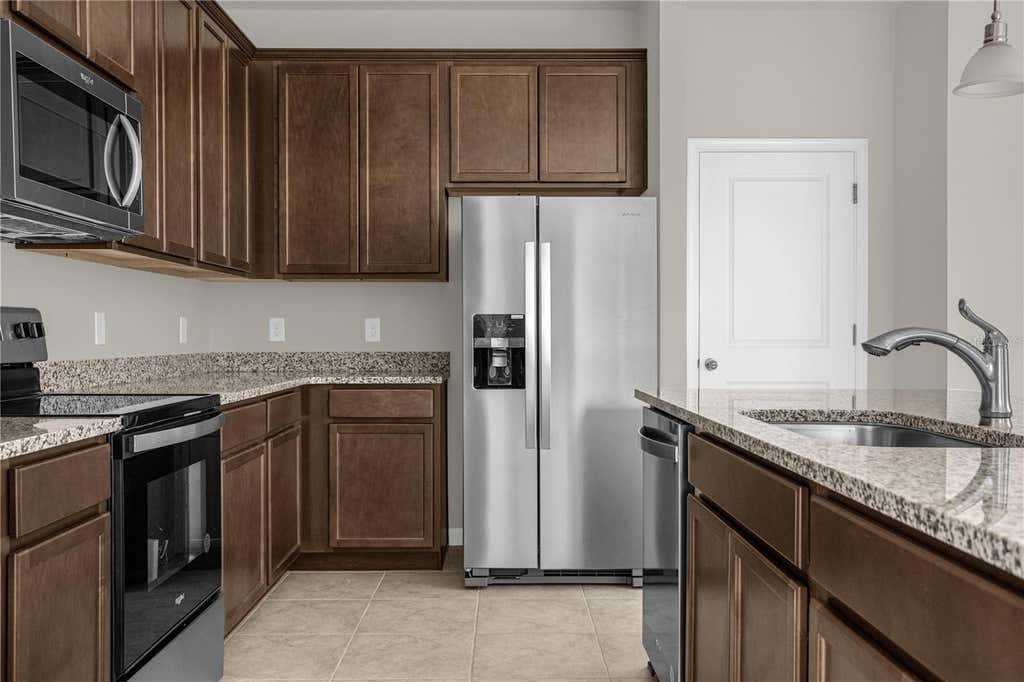 Photo of 1926 Holden Ridge Lane, Clermont, FL 34715 (MLS # O6427492)