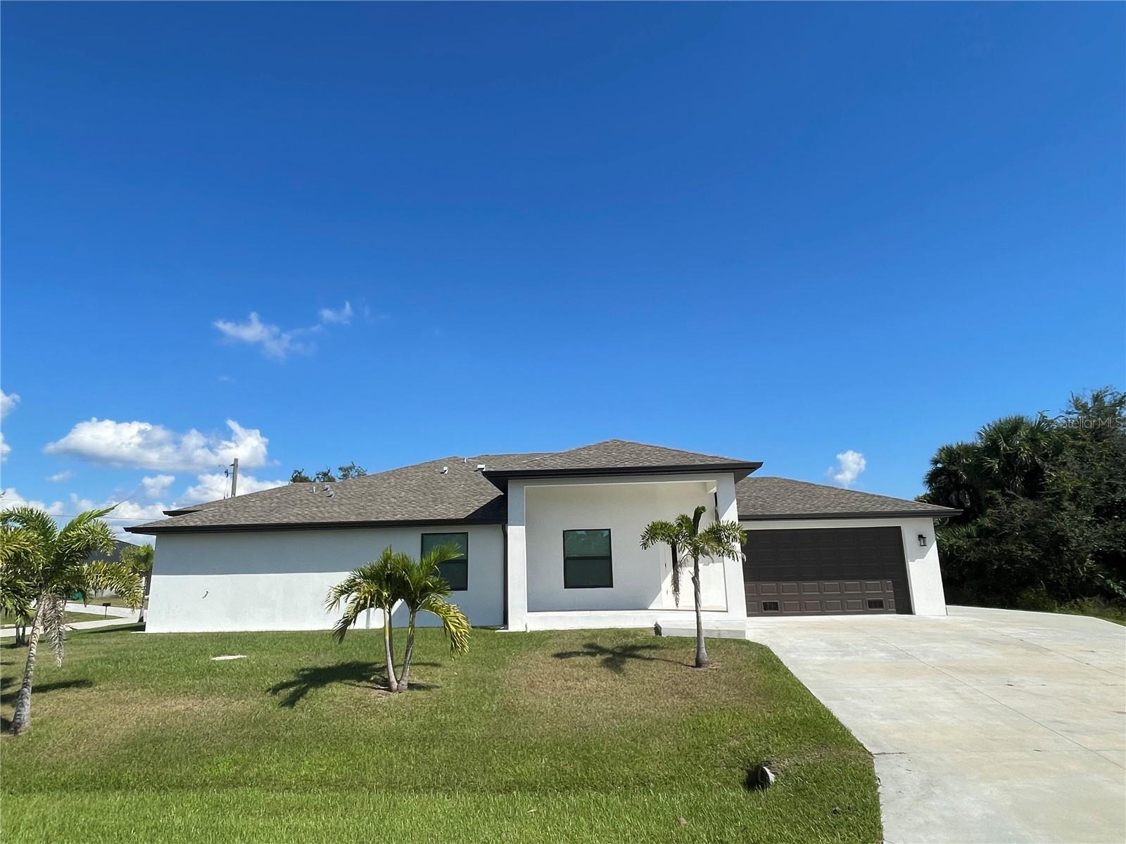 Welcome to this modern 3-bedroom, 2-bath, 2-car garage duplex, built in 2024 and located in the desirable waterfront community of South Gulf Cove. Sitting on a corner lot, this beautiful home features stunning wood-look vinyl floors throughout, high 10-foot ceilings, and a spacious open layout that creates an inviting, airy feel.
The kitchen is a showstopper, featuring stainless steel appliances, granite countertops, and a large granite island — perfect for entertaining or casual dining. The primary suite easily accommodates a king-size bed and includes a walk-in closet and a beautifully tiled shower in the master bath.  Washer and dryer included. 
South Gulf Cove is one of Southwest Florida’s premier boating and beach communities, with easy access to the Myakka River, Charlotte Harbor, and the Gulf of Mexico. Enjoy community sidewalks, parks, a public boat ramp, picnic areas, a linear walkway, and a playground. The scenic canals are ideal for kayaking, paddleboarding, and fishing.
Located just 15 minutes from the pristine beaches of Boca Grande and Englewood, and close to Port Charlotte Town Center’s shopping and dining, this home offers both convenience and coastal charm. Centrally positioned between Fort Myers and Sarasota, endless lifestyle opportunities await.  Tenant to pay all utilities.