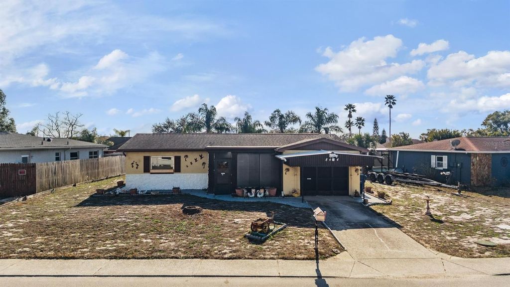 Photo of 8434 Luray Drive, Port Richey, FL 34668 (MLS # TB8479474)