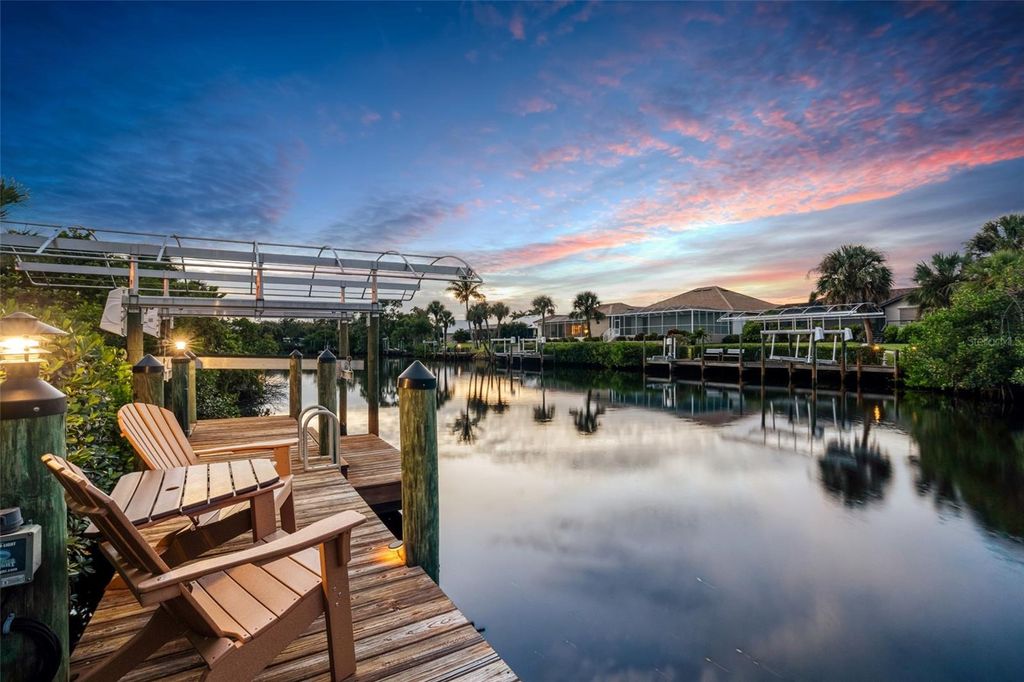 Photo of 10170 Creekside Drive, Placida, FL 33946 (MLS # C7514373)