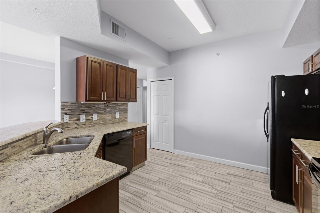Photo of 6336 Buford Street #801, Orlando, FL 32835 (MLS # O6416544)
