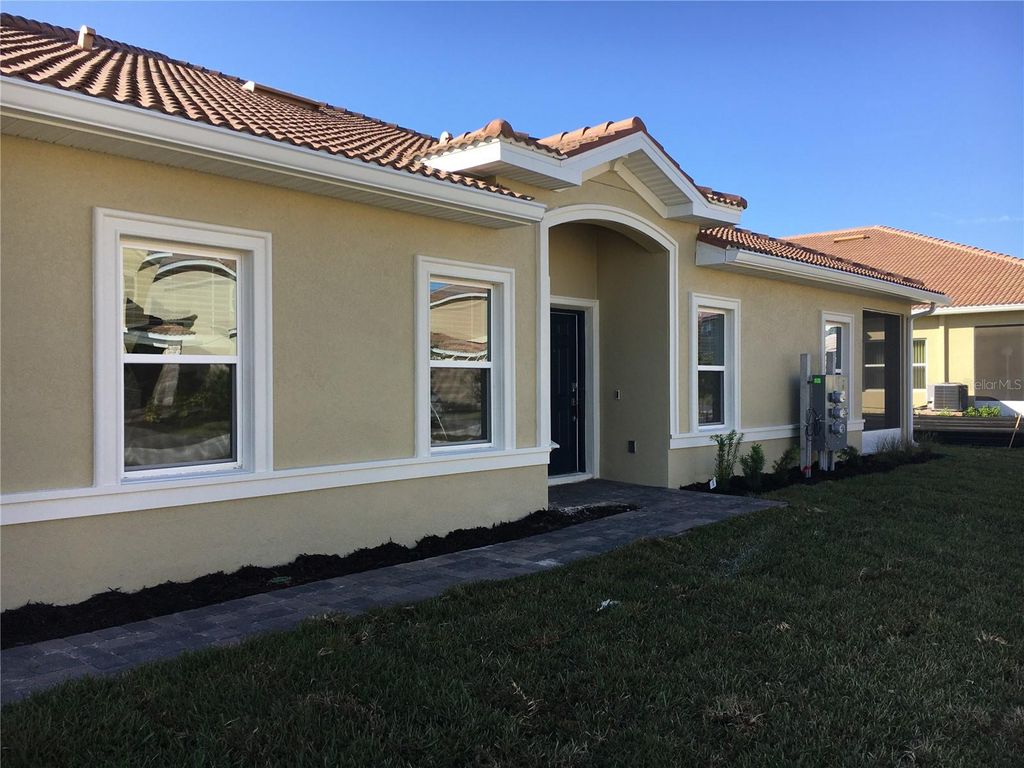 Photo of 1050 Quaker Ridge Lane, Davenport, FL 33896 (MLS # O6408320)