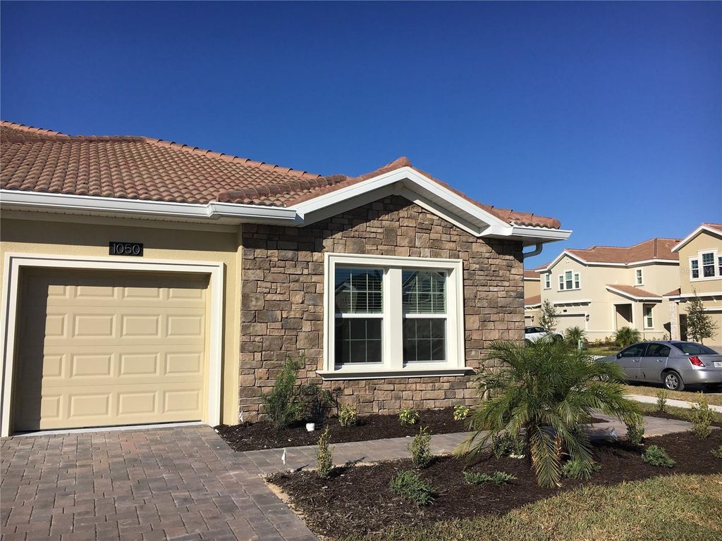 Photo of 1050 Quaker Ridge Lane, Davenport, FL 33896 (MLS # O6408320)