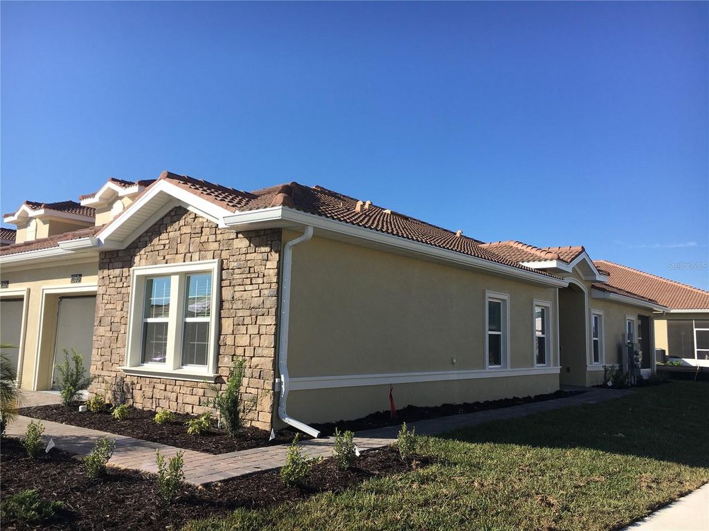 Photo of 1050 Quaker Ridge Lane, Davenport, FL 33896 (MLS # O6408320)