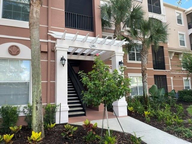 Photo of 1351 Venezia Court #305, Davenport, FL 33896 (MLS # O6423624)