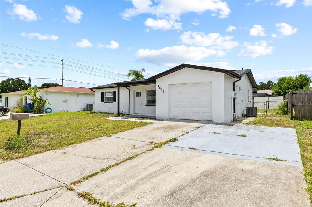 Photo of 8046 Norwich Drive, Port Richey, FL 34668 (MLS # TB8408671)