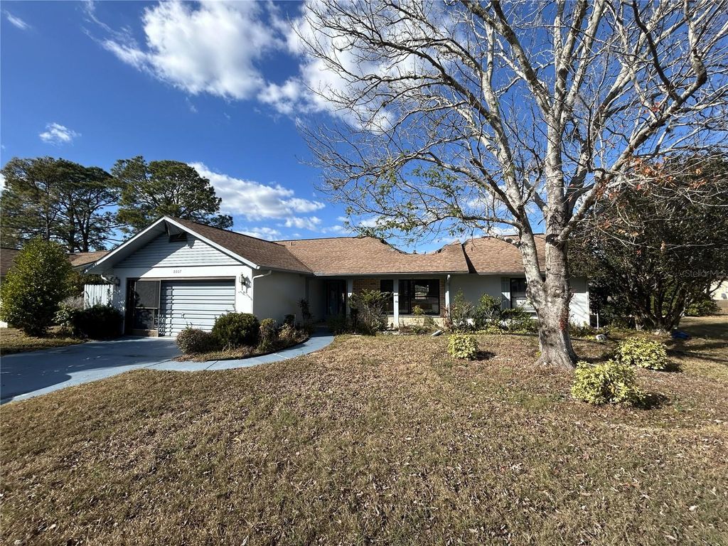 Photo of 8807 Heather Boulevard, Weeki Wachee, FL 34613 (MLS # TB8469493)