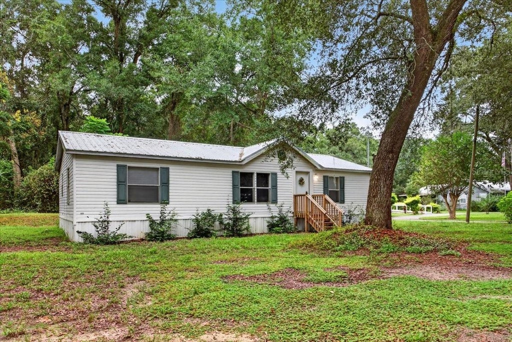 Photo of 7030 NW 167th Place, Trenton, FL 32693 (MLS # GC544090)