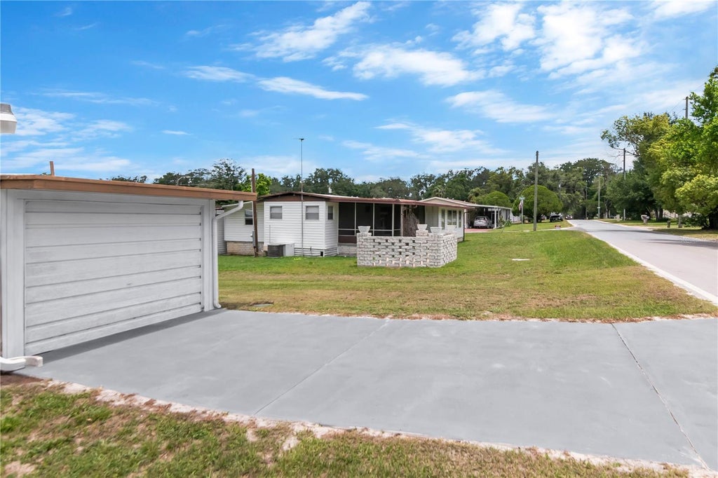 Photo of 39219 Ola Avenue, Zephyrhills, FL 33542 (MLS # TB8516310)