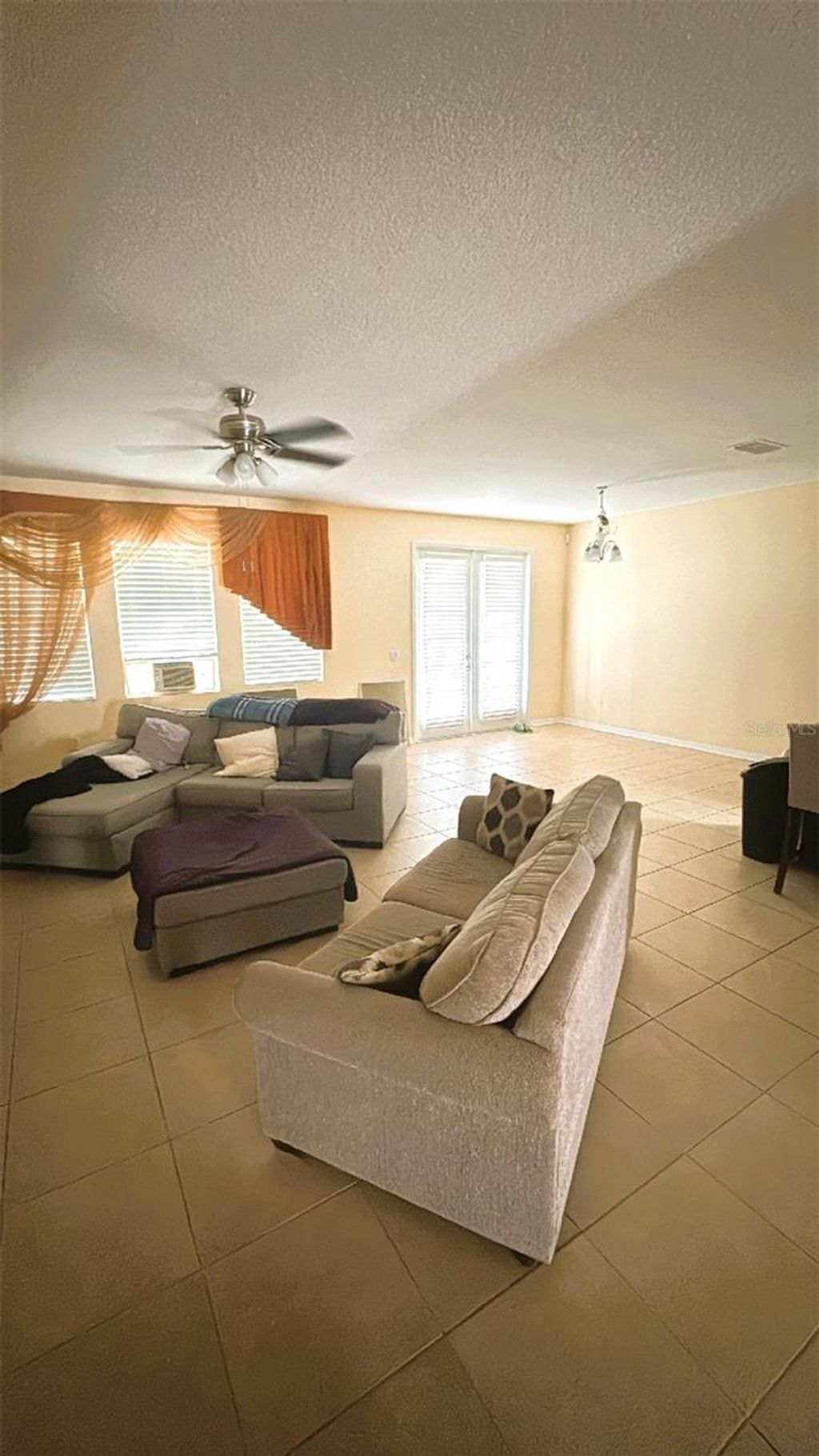 Photo of 12193 Prairie Plantation Way, Orlando, FL 32824 (MLS # O6375868)