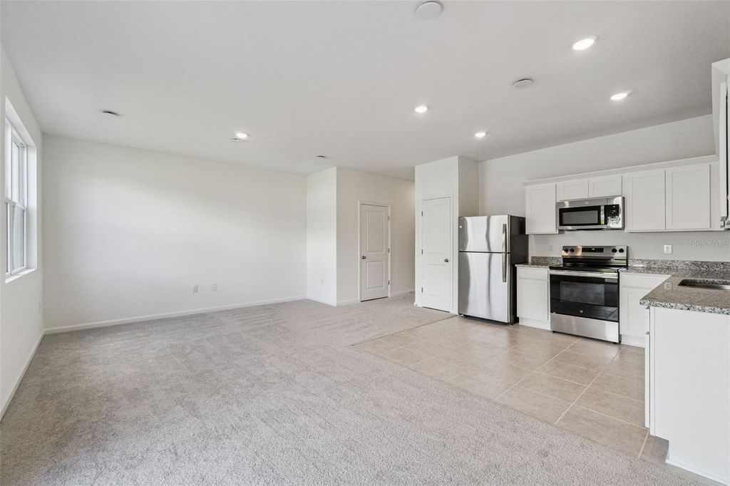 Photo of 3613 Spire Dr, Davenport, FL 33837 (MLS # O6355370)