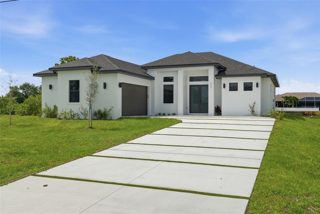 Photo of 227 NE 15th Street, Cape Coral, FL 33909 (MLS # O6446783)