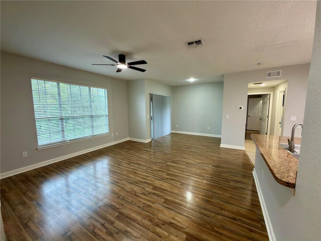 Photo of 13235 Sanctuary Cove Drive #303, Temple Terrace, FL 33637 (MLS # TB8484345)