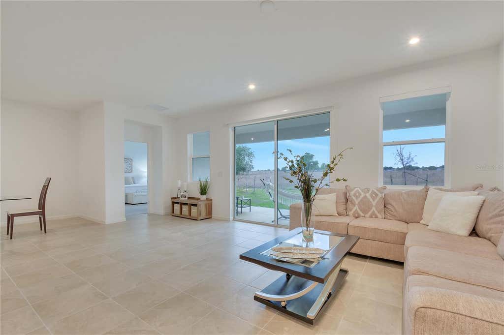 Photo of 1098 Boardwalk Place, Kissimmee, FL 34747 (MLS # O6428335)