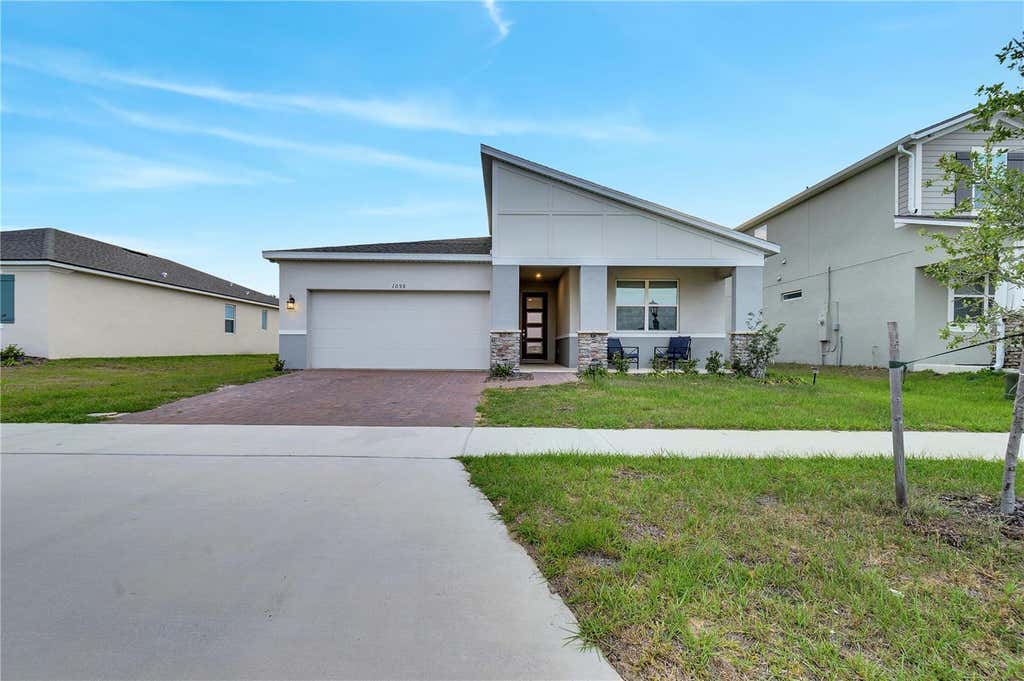 Photo of 1098 Boardwalk Place, Kissimmee, FL 34747 (MLS # O6428335)
