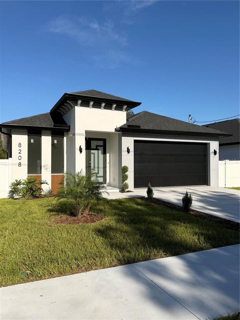 Photo of 8208 N Elmer Street, Tampa, FL 33604 (MLS # TB8537693)