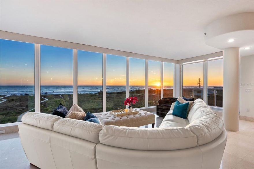 Exquisite Gulf-Front Penthouse – A Private Full-Floor Residence Steps to Siesta Key’s Pristine Sands.

Immerse yourself in the ultimate coastal luxury lifestyle with this spectacular Gulf-front penthouse, located in an exclusive three-residence boutique building, where each home occupies its own private floor. Just steps from the world-renowned powdery quartz sands of Siesta Beach, this one-of-a-kind three-bedroom, three-and-a-half-bath residence offers breathtaking, unobstructed panoramic views of the azure Gulf waters and vibrant sunsets from nearly every room.

Designed for the beach-loving connoisseur, this exceptional home features three spacious bedrooms, including two private suites, each with spa-inspired baths and floor-to-ceiling windows showcasing endless Gulf vistas. A second-story bonus room with a half bath provides a versatile space ideal for a media room, home office, or guest retreat, all while offering stunning rooftop views.

From the moment you step off the private-stop elevator directly into your full-floor residence, you’re met with sweeping Gulf views framed by walls of glass, filling the interiors with natural light and a seamless indoor-outdoor ambiance. The expansive open-concept living space is ideal for both everyday living and entertaining. The gourmet kitchen is a chef’s dream, featuring premium appliances, sleek modern cabinetry, and elegant stone countertops. Travertine and rich wood flooring add warmth and refinement throughout.

The magnificent rooftop terrace offers complete privacy for sunbathing, entertaining, or unwinding while enjoying soothing sea breezes and postcard-worthy sunsets. Additional luxury amenities include a secure lobby, a rare two-car tandem garage with private driveway, and private elevator access—delivering the comfort and privacy typically found only in single-family beachfront estates.

On the ground level, an inviting shaded outdoor lounge and dining area with a built-in grill creates the perfect setting for alfresco meals under the stars—all just a short stroll along a private shell path to the soft white sands of Siesta Beach.

Beyond the beach, enjoy the vibrant energy of Siesta Village, with boutique shopping, fine dining, and lively nightlife just minutes away.

If you value privacy, exclusivity, and true full-floor living paired with direct beach access, this extraordinary penthouse presents a rare opportunity to own one of Siesta Key’s most coveted Gulf-front residences.