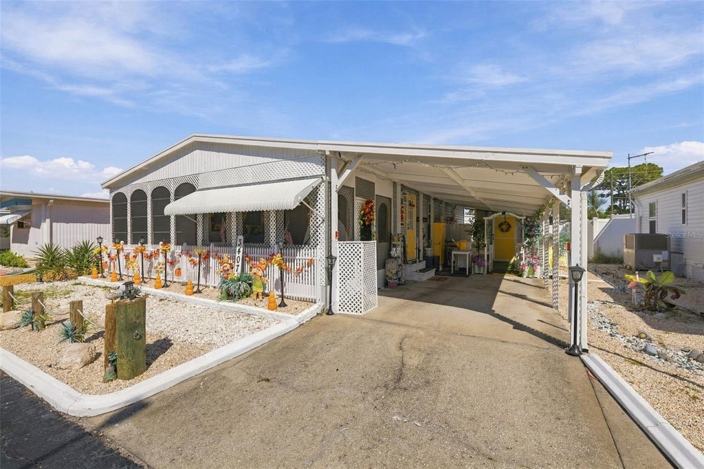 Photo of 3407 Tiki Drive, Holiday, FL 34691 (MLS # TB8556536)
