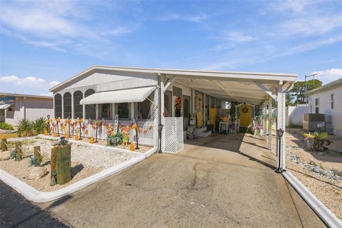 Photo of 3407 Tiki Drive, Holiday, FL 34691 (MLS # TB8556536)