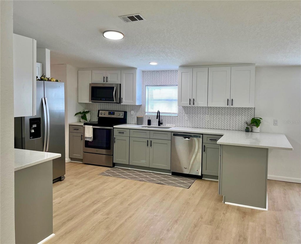 Photo of 109 3rd Street, Orlando, FL 32824 (MLS # S5156065)