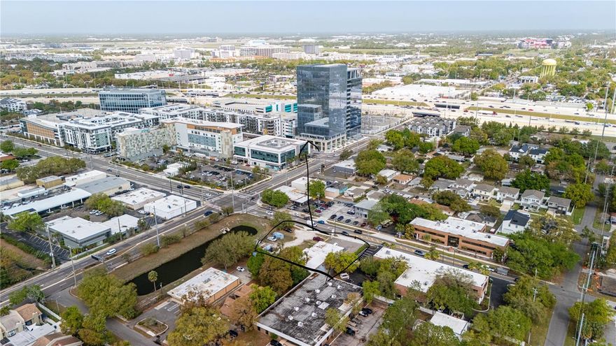 Commercial Investment Opportunity directly across from MIDTOWN TOWN CENTER ! Build your business, your restaurant, your Medical Complex, the opportunities are endless ! ideal spot with great exposure!