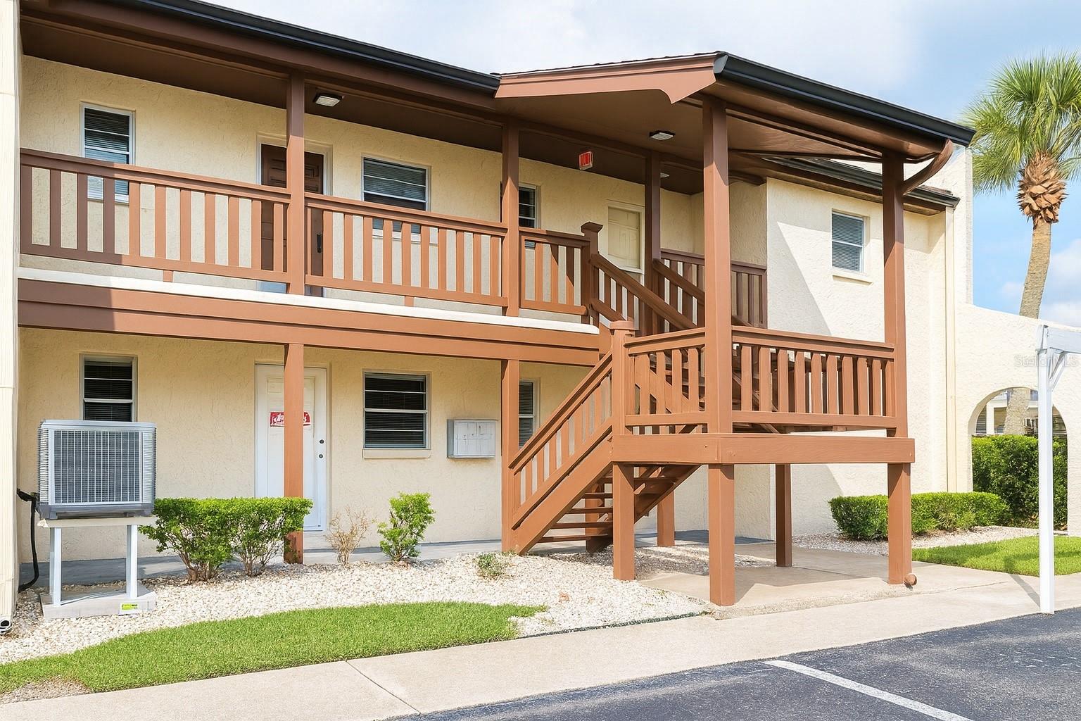 Welcome to Harbor Villas, a quiet and well-kept community where comfort and convenience come together. This freshly painted upstairs condo offers a spacious one-bedroom layout with two large closets and a Jack-and-Jill bathroom that connects the bedroom to the main living area for easy access.
Inside, you’ll find laminate flooring throughout, with tile in the kitchen for added durability. The kitchen is equipped with updated stainless-steel appliances and plenty of cabinet space, while the open living and dining area provides a natural flow for both daily living and entertaining. Sliding doors lead to a screened lanai with its own storage closet, perfect for enjoying your morning coffee or evening breeze. There’s also an additional outdoor storage nook for extra convenience. AC air handler 2022.
Harbor Villas residents enjoy access to a clubhouse, shuffleboard courts, and on-site, same level, laundry facilities, all set among beautifully maintained grounds. For those who love the coastal lifestyle, an optional membership to the Gulf Harbors Private Beach Club is available, offering a private sandy beach, shaded pavilions, picnic areas, BBQ grills, and stunning Gulf views.
Located just off Marine Boulevard, this condo places you close to shopping, dining, and Florida’s renowned Gulf beaches. Offered for sale or for rent (whichever comes first; see MLS Rental Listing TB8409055), this property makes an excellent year-round residence, seasonal retreat, or investment opportunity.