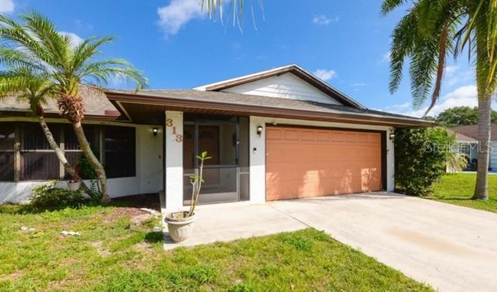 Photo of 313 SE Wallace Terrace, Port Saint Lucie, FL 34983 (MLS # TB8480216)