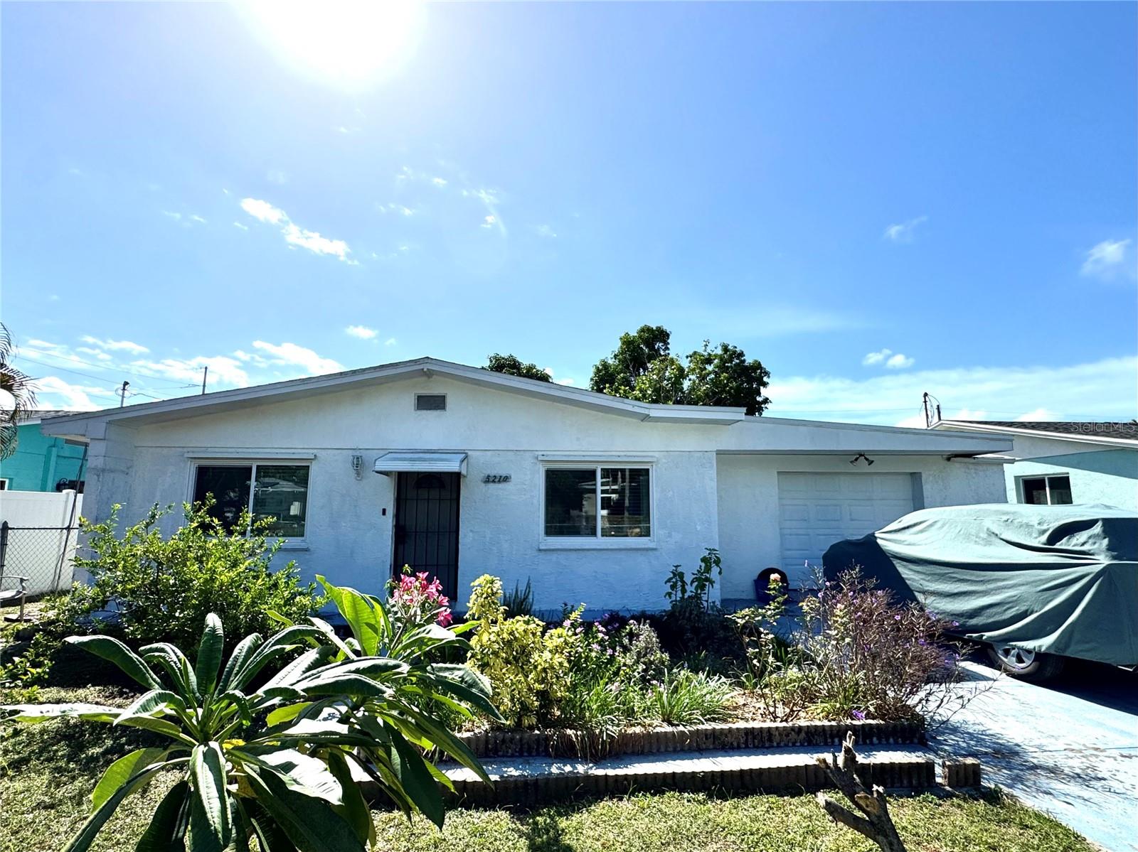 Beautiful 4-Bedroom Home Near St. Pete Beach!
Welcome to this roomy 4-bedroom, 3-bathroom block home just 4 miles from St. Pete Beach! Enjoy Florida living at its finest with a fully fenced yard—perfect for your pets—and no CDD or HOA restrictions.
This home offers updates throughout, including:
Plumbing system updated in 2020,
HVAC system updated in 2022,
Hot water heater replaced in 2022,
Whole house water purification system,
New hurricane-rated windows installed in 2023, plus additional hurricane shutters for extra protection.
Solar panels keeping your electric bill around $42/month.
The property also features a two-car garage, large mango tree and other fruit trees in the back yard with lots of shade.
Don’t miss this great home just minutes from beautiful beaches, shopping, and dining!
