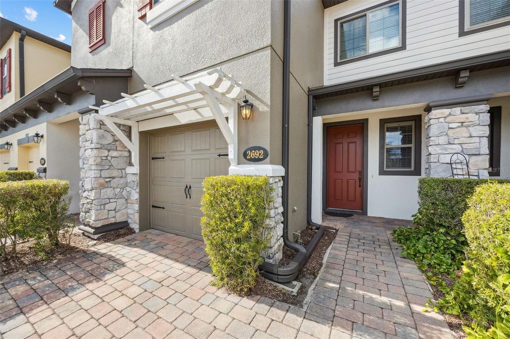 Photo of 2692 White Isle Lane #103, Orlando, FL 32825 (MLS # O6375059)