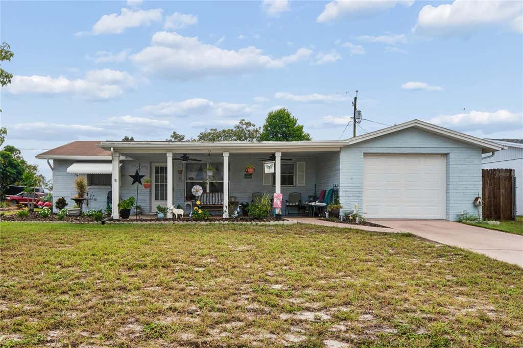 Photo of 7106 Palisade Drive, Port Richey, FL 34668 (MLS # W7888830)