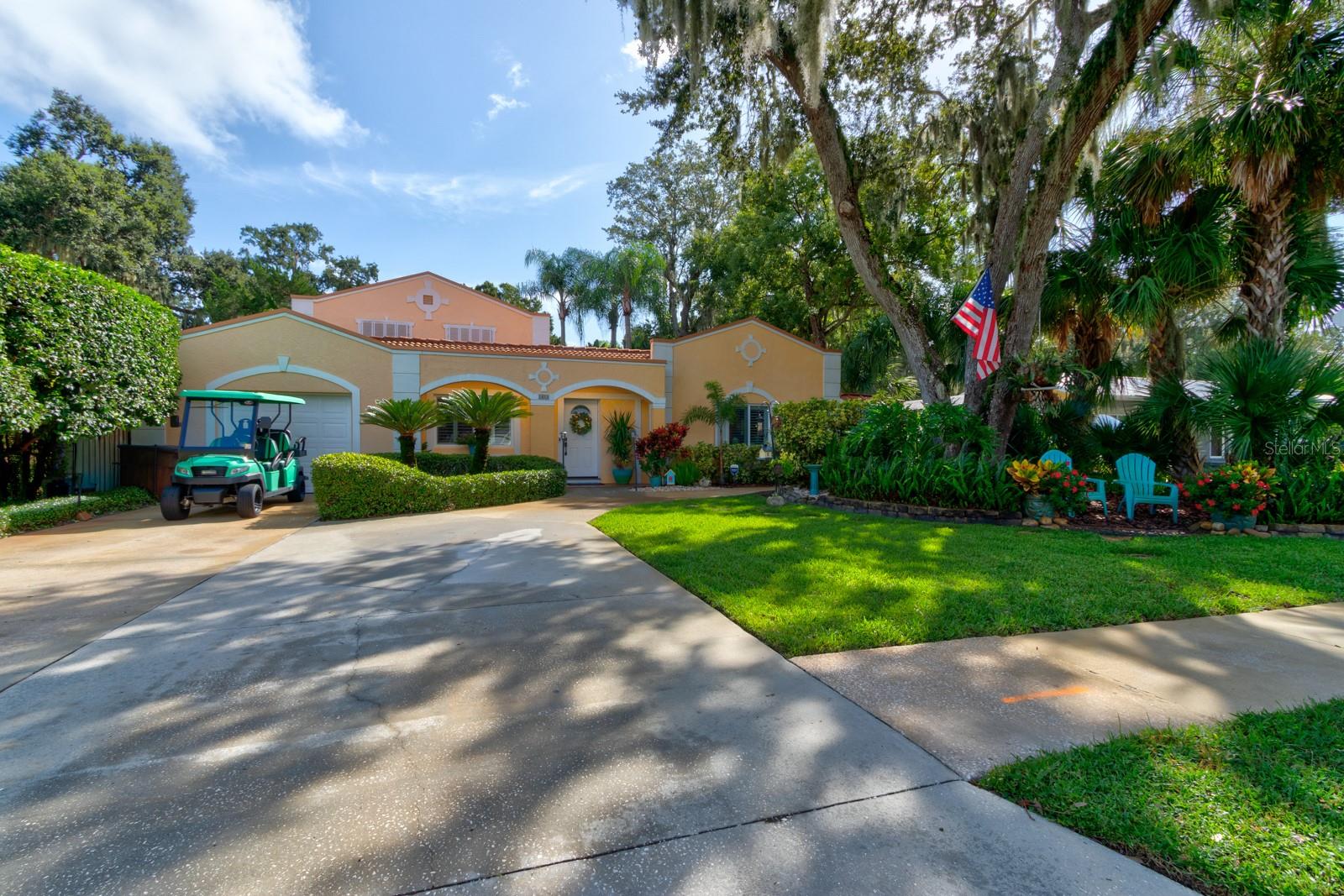 The moment you have been waiting for! --> Welcome Home to 1413 Live Oak Street New Smyrna Beach, a mid-century coastal masterpiece between US-1 and the river, golf-cart close to Canal Street and Flagler Avenue shopping boutiques and eateries, art walks, farmers market, and minutes to the beach. Originally the residence of famed photographer Jack Mitchell, the property retains his studio; now a detached poolside guest cottage with a full bath set behind lush private gardens and a screened sparkling resurfaced 35'×20' saltwater pool with new pebbletec pool deck, new pump, and new saltwater generator. For peace of mind: the home is located in coveted Flood Zone X with no history of flooding. Just a short stroll brings you to Yacht Club Island and the river, perfect for walks, sunrises, or launching your coastal adventures. Inside, thoughtful upgrades and remodeling projects (1995) honor the 1952 architecture while delivering today’s comforts: top-of-the-line kitchen with quartz countertops, glass backsplash, 42" inch shaker style cabinets with display cases, dovetail soft-close drawers, and premium top-of-the-line stainless appliances. Step into an inviting large family room with wood-burning fireplace, perfect for gatherings. The primary suite is on the main floor with cozy powder area and an elegant remodeled primary en suite bathroom. Upstairs offers two additional bedrooms and a guest bathroom with timeless wood floors and tile in the restroom. Plantation shutters run throughout both levels of the main home as well as the guest house, complemented by built-in baseboards that preserve the home’s character and quality of construction. Tile and luxury vinyl plank flooring span the first floor, and a large laundry and storage room completes your checklist. The guest house/pool cottage is fully tiled with porcelain floors, a river-rock bathroom floor, and ADA-compliant features including the bathroom, entry, and sidewalk approach. It also includes a partial kitchenette, making it perfect for extended stays or multi-generational living. Dual A/C systems (recently serviced and tuned for prime comfort), plumbing updates, hurricane-impact windows, storm shutters on most windows, seamless leaf guard gutters, and a 100-year concrete tile roof deliver true turnkey confidence. Irrigation in the front, back, and landscaped beds, along with a pergola and multiple outdoor seating areas, create a hidden oasis that feels like a private resort. This property has been chosen to be featured on the 2026 Coalition Home Tour, a testament to its architectural significance and exquisite presentation. All this is the authentic historic-district character that new builds try to imitate, but can’t duplicate, wrapped in impeccable, move-in-ready condition. Schedule a viewing today!